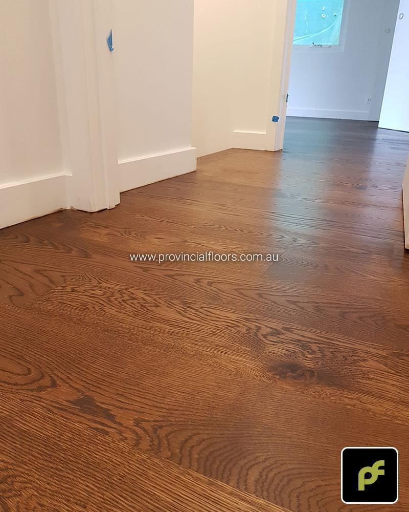 180mm x 14mm American Oak Strip Timber Flooring. Finished with a Brown Coloured Oil/Wax Finish. Matte in sheen.