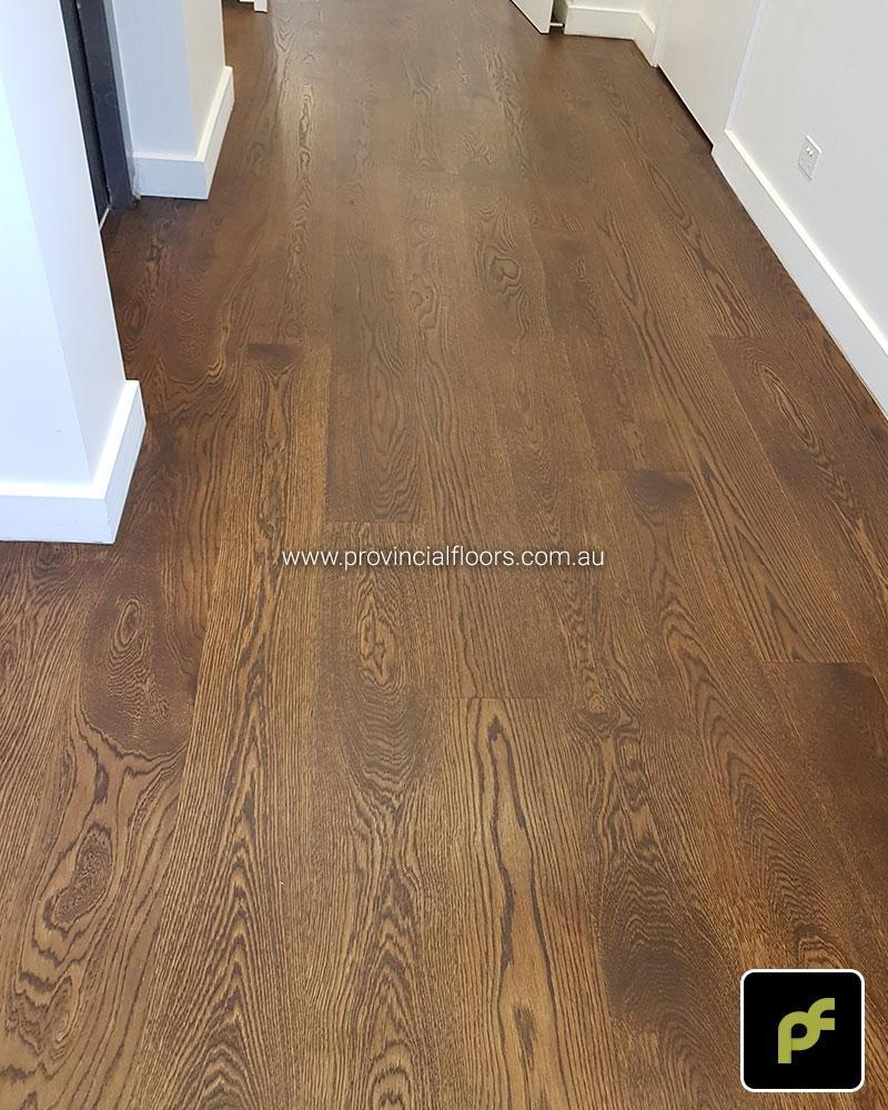 180mm x 14mm American Oak Strip Timber Flooring. Finished with a Brown Coloured Oil/Wax Finish. Matte in sheen.