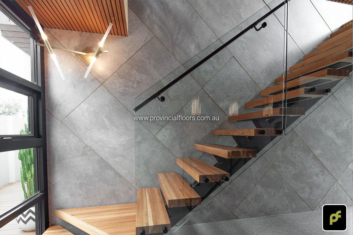 Solid American Oak Staircase Polished. Stained and Finished with a Waterbased Polyurethane. Satin in sheen.