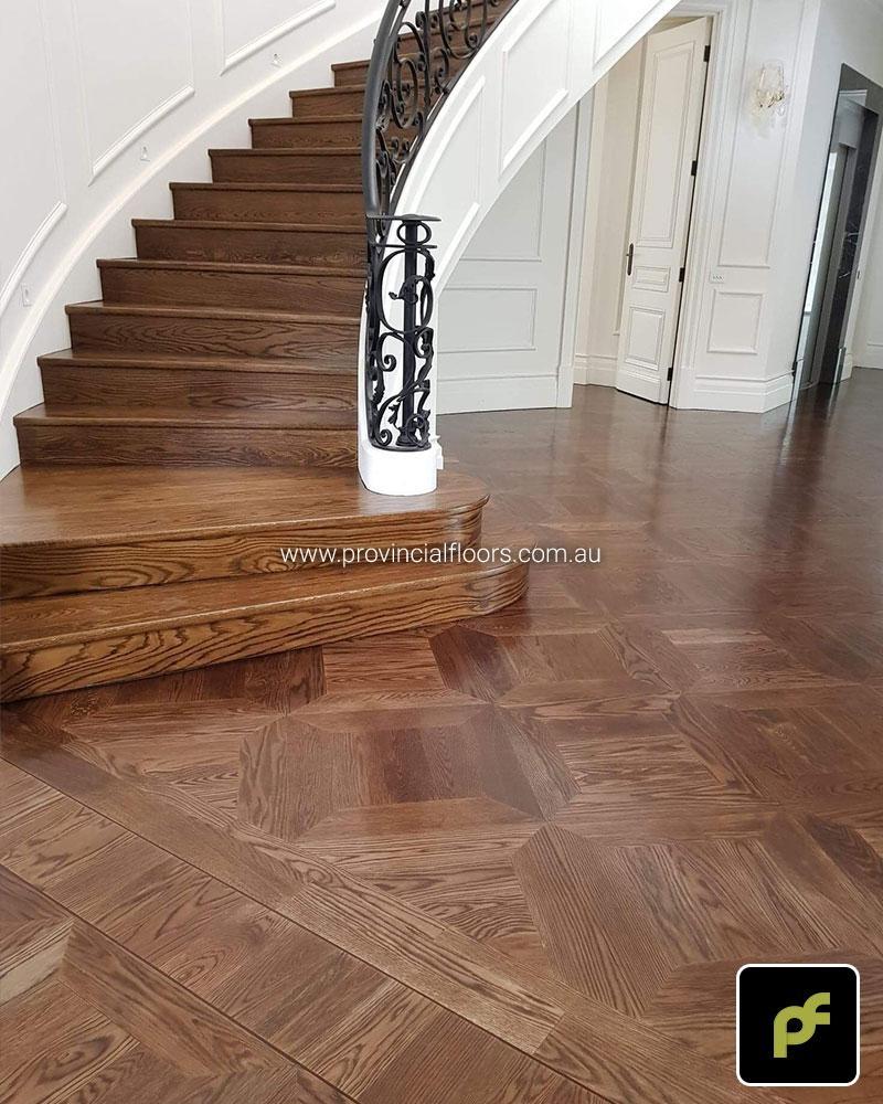 Solid American Oak Staircase Polished. Stained and Finished with a Waterbased Polyurethane. Satin in sheen.
