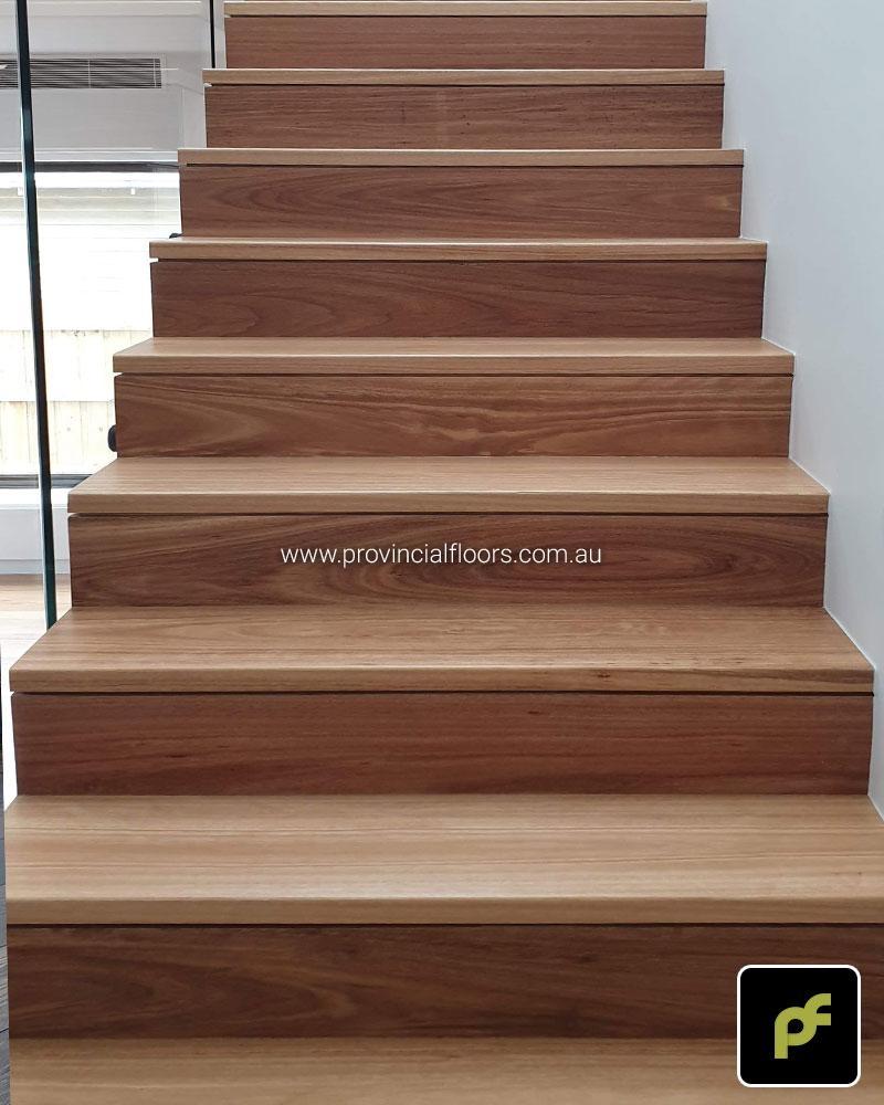 Solid Blackbutt Staircase Polished. Finished with a Waterbased Polyurethane. Satin in sheen.