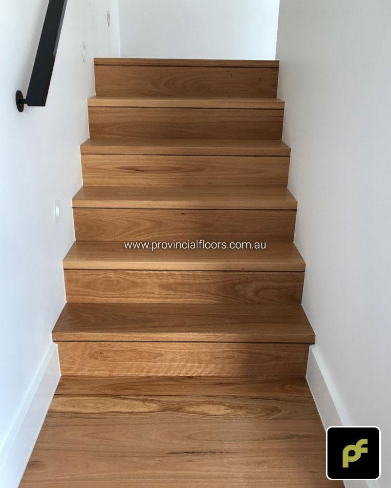 Solid Blackbutt Staircase Polished. Finished with a Waterbased Polyurethane. Satin in sheen.