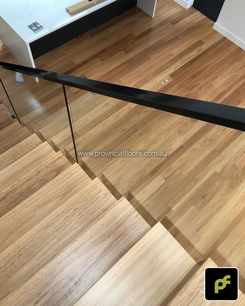 Solid Blackbutt Staircase Polished. Finished with a Waterbased Polyurethane. Satin in sheen.