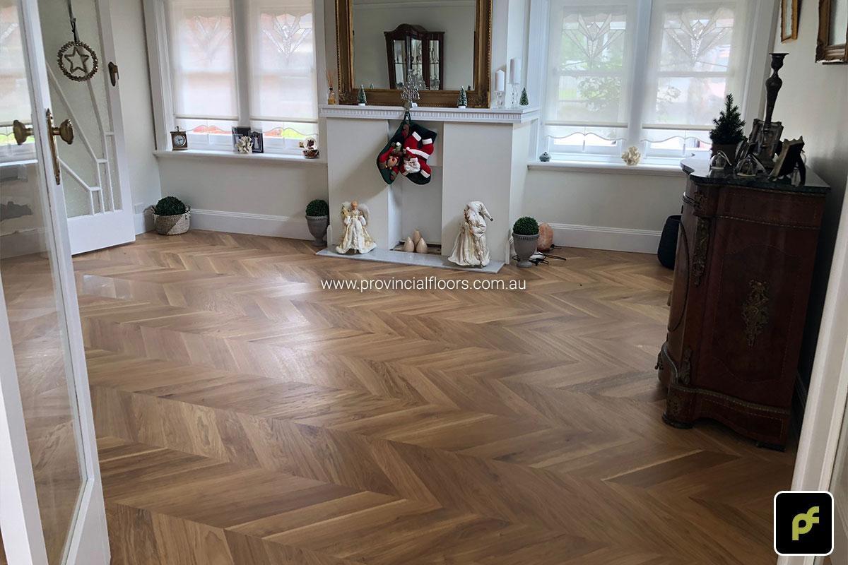 European Oak Chevron Parquetry with a Natural Coloured Oil/Wax Finish. Matte in sheen and easily repairable.