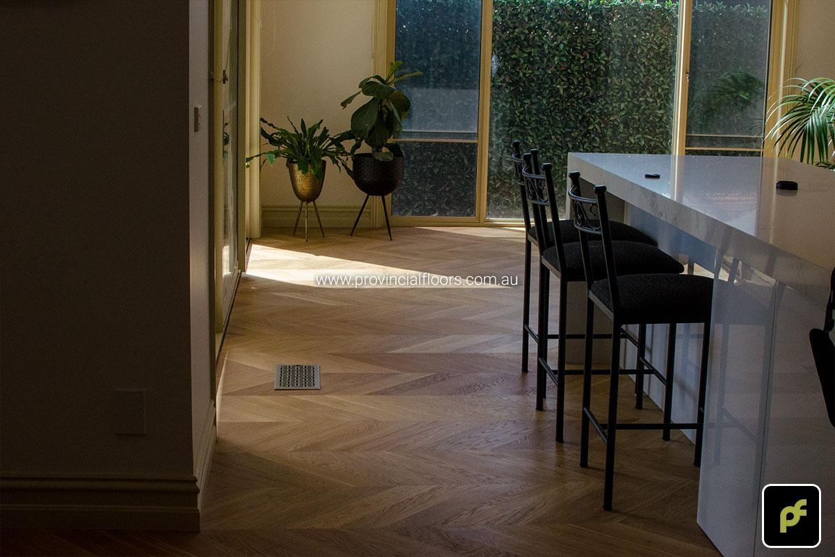 European Oak Chevron Parquetry with a Natural Coloured Oil/Wax Finish. Matte in sheen and easily repairable.