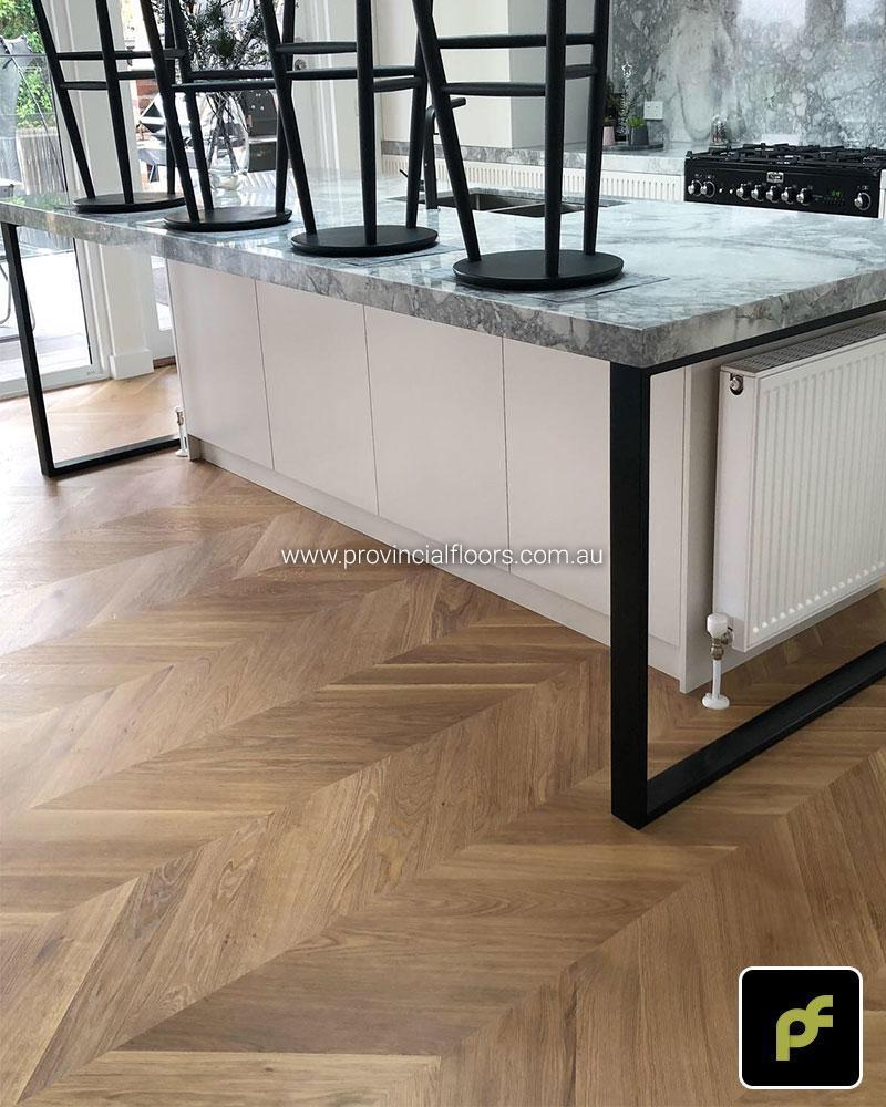 European Oak Chevron Parquetry with a Natural Coloured Oil/Wax Finish. Matte in sheen and easily repairable.