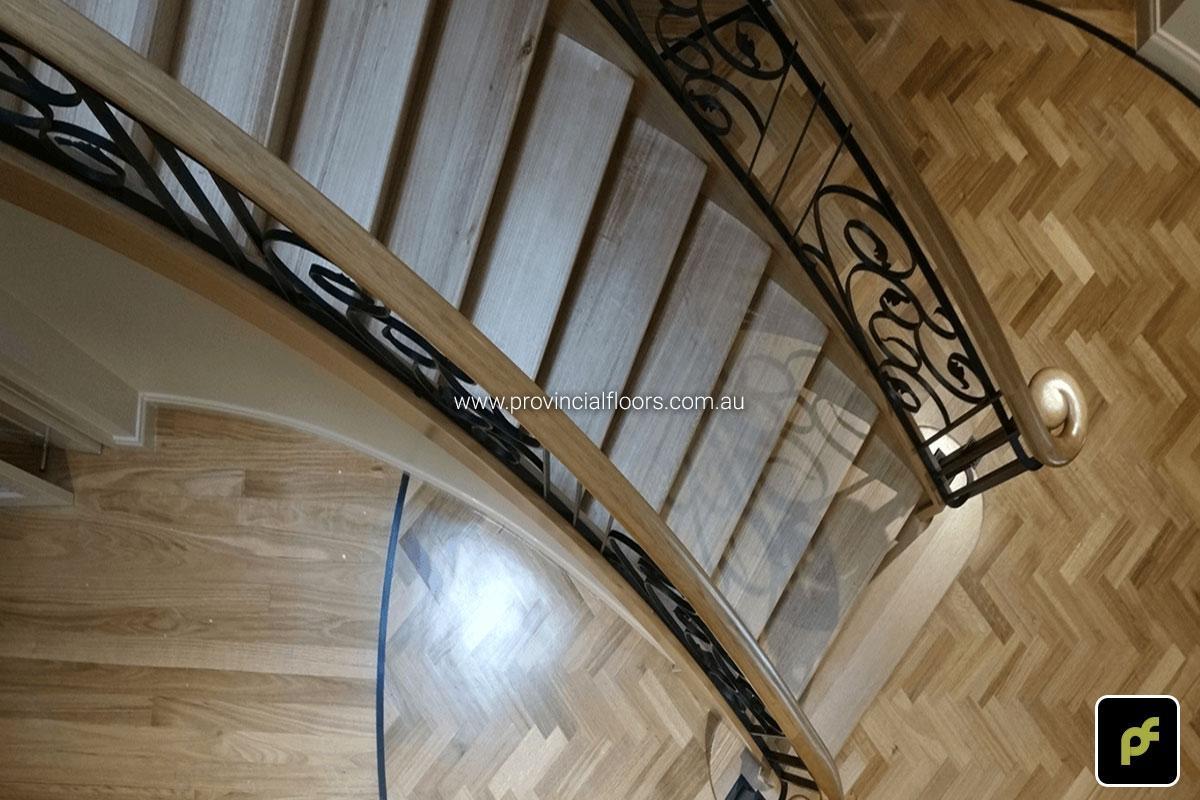 Tasmanian Oak Herringbone Parquetry in a circular border design. With a Water-Based Polyurethane Finish. Satin in sheen.