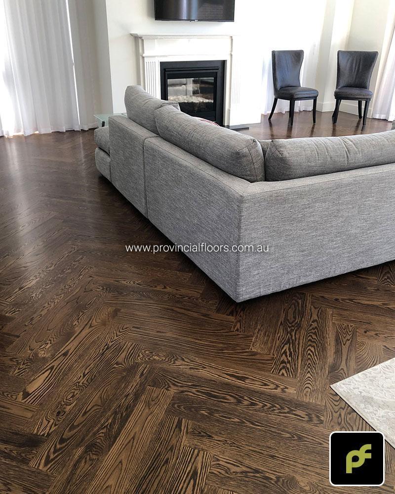 American Oak Herringbone Parquetry with a Stained Water-Based Polyurethane Finish. Satin in sheen.