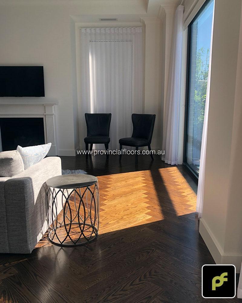 American Oak Herringbone Parquetry with a Stained Water-Based Polyurethane Finish. Satin in sheen.