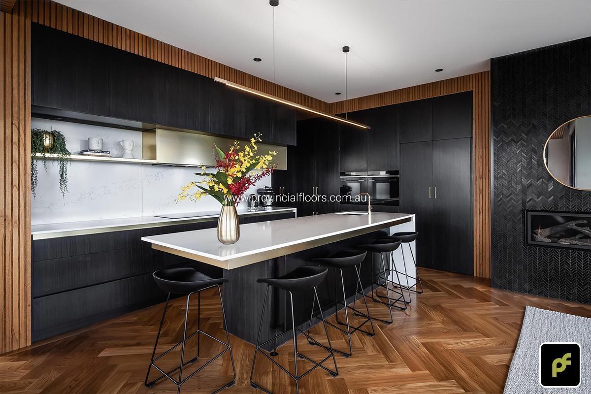 American Oak Herringbone Parquetry with a Stained Water-Based Polyurethane Finish. Satin in sheen.