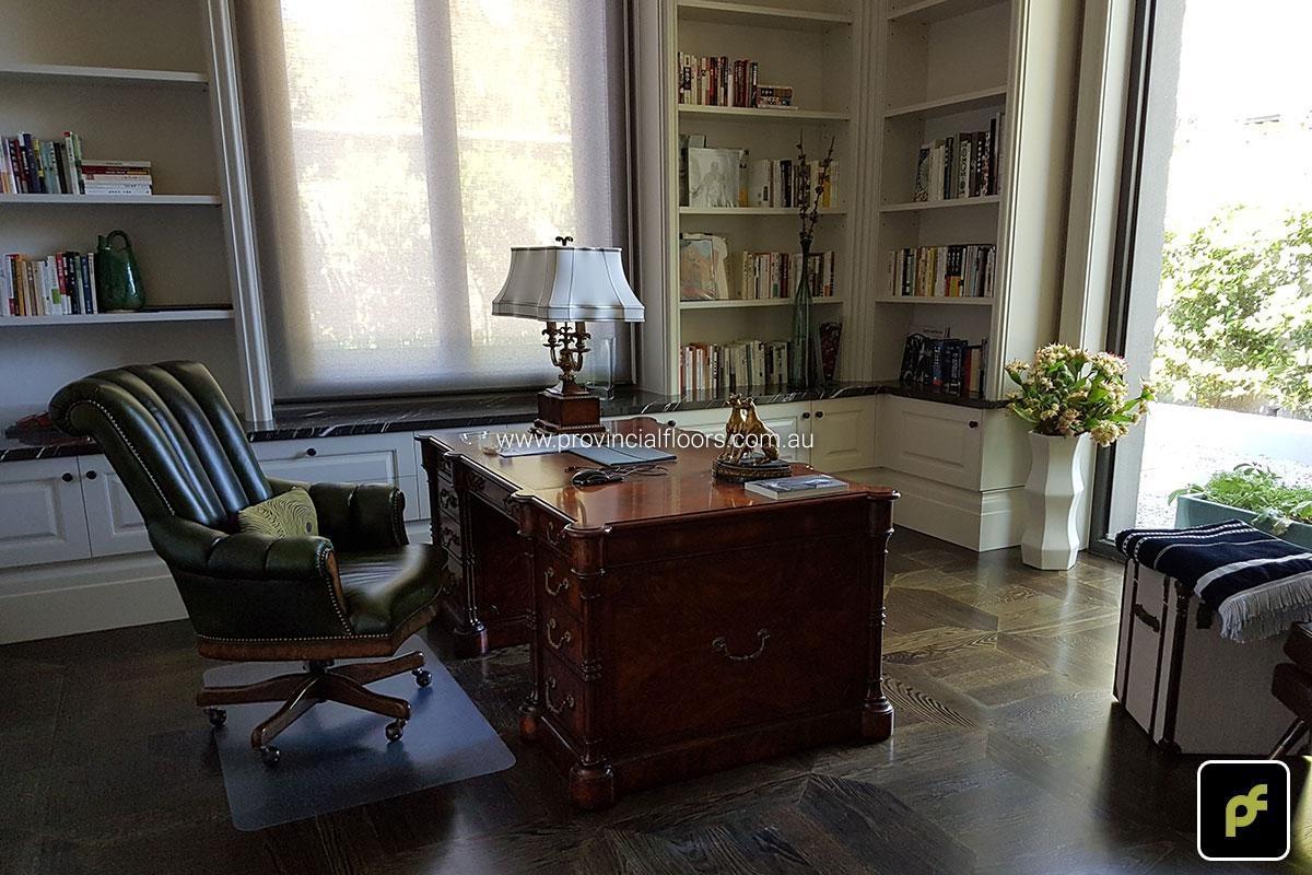 American Oak hand-made Monticello Paneled Parquetry with circumnavigating border designs. With a Stained Water-Based Polyurethane Finish. Satin in sheen.