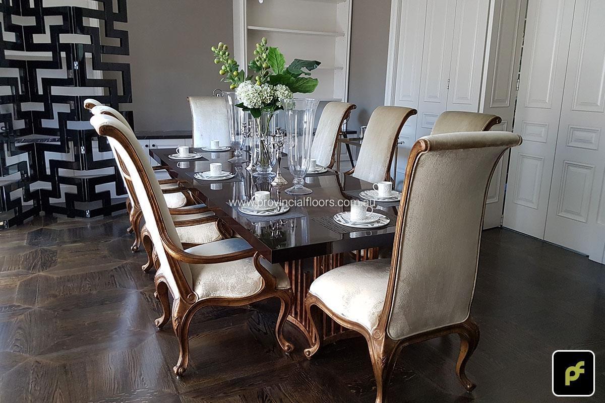 American Oak hand-made Monticello Paneled Parquetry with circumnavigating border designs. With a Stained Water-Based Polyurethane Finish. Satin in sheen.