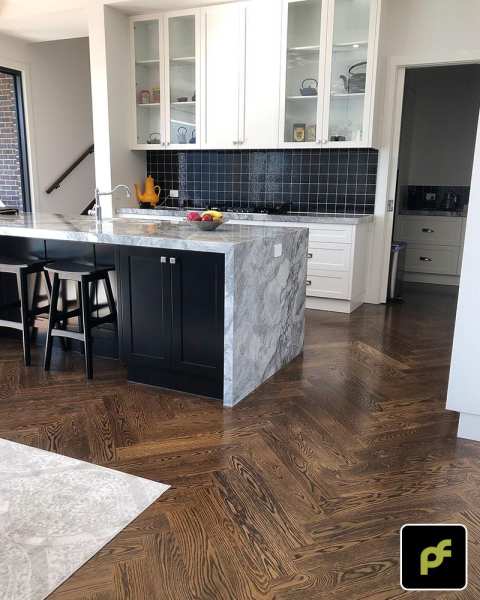 American Oak Herringbone Parquetry with a Stained Water-Based Polyurethane Finish. Satin in sheen.