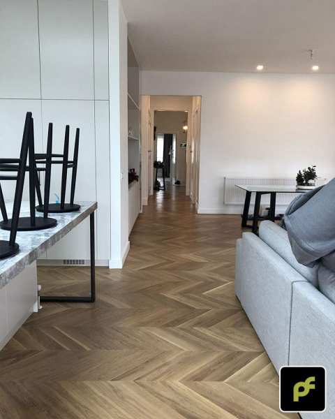 European Oak Chevron Parquetry with a Natural Coloured Oil/Wax Finish. Matte in sheen and easily repairable.