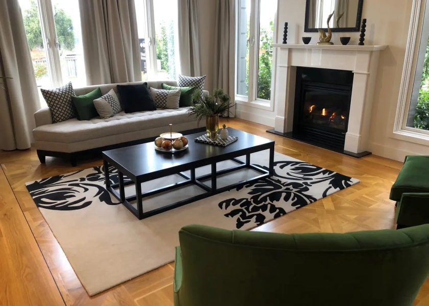 European Oak Marie Antoinette Parquetry Flooring with a circumnavigating border design. With a Waterbased Coating. Satin in sheen - Rumpus with Fireplace