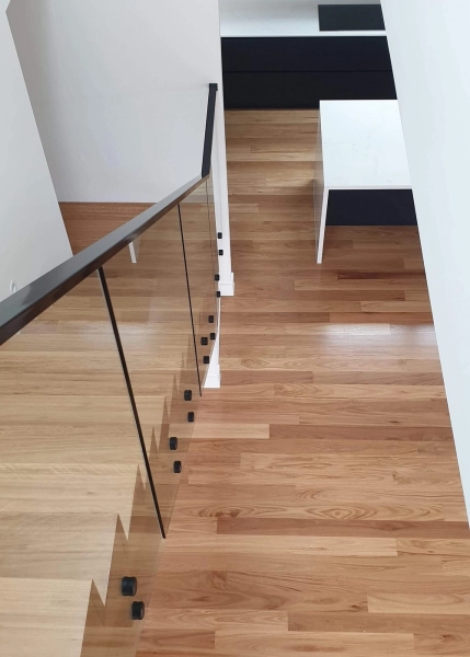 130mm x 19mm Select Grade Blackbutt Timber Flooring. Finished with Waterbased Coating. Satin in sheen - Stairs and Kitchen