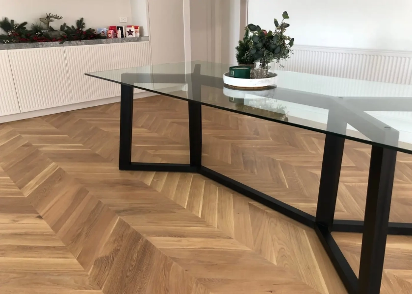 European Oak Chevron Parquetry Flooring with a Natural Coloured Oil/Wax Finish. Matte in sheen - Dining Table