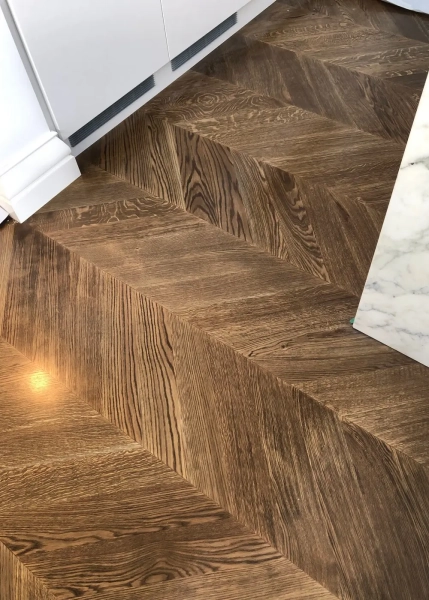 European Oak Chevron Flooring with a Stained Waterbased Coating Finish. Satin in sheen - Close Up