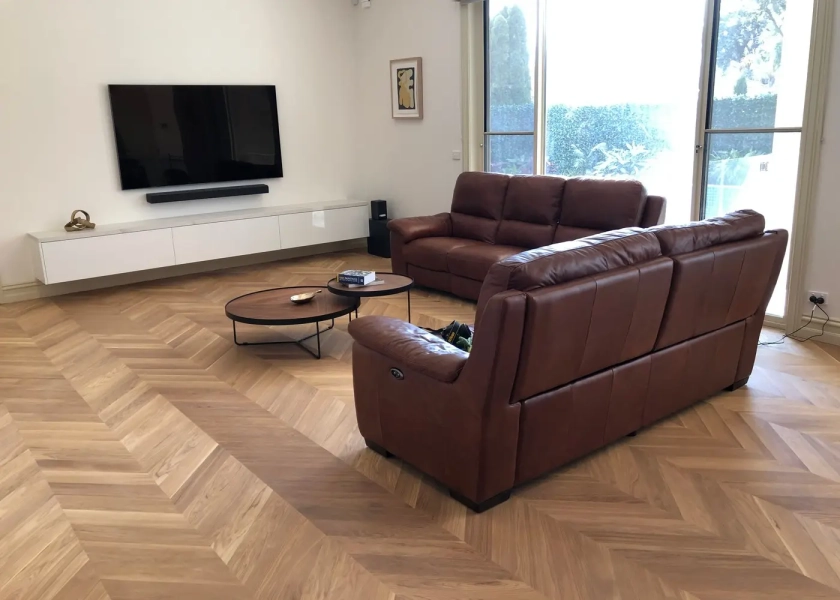 European Oak Chevron Parquetry Flooring with a Natural Coloured Oil/Wax Finish. Matte in sheen - Living
