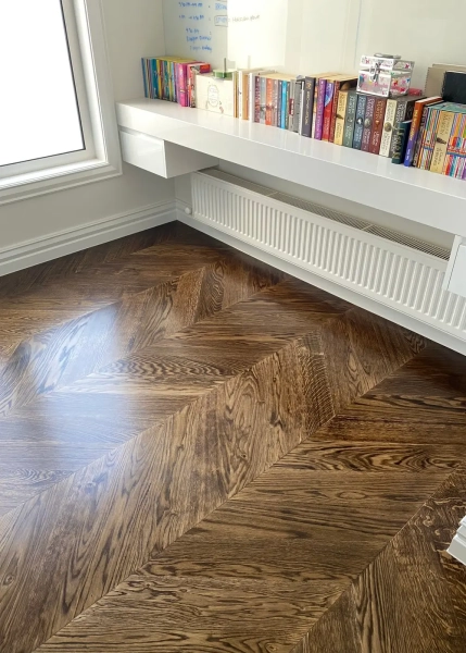 European Oak Chevron Flooring with a Stained Waterbased Coating Finish. Satin in sheen - Upstairs Shelf