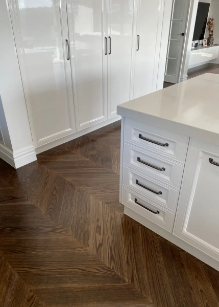 European Oak Chevron Flooring, Stained and finished with Waterbased Coating. Satin in sheen - Kitchen Close Up