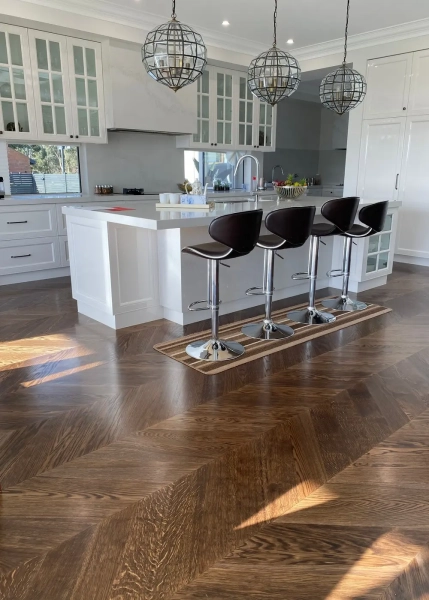 European Oak Chevron Parquetry Flooring, Stained and finished with Waterbased Coating. Satin in sheen - Kitchen