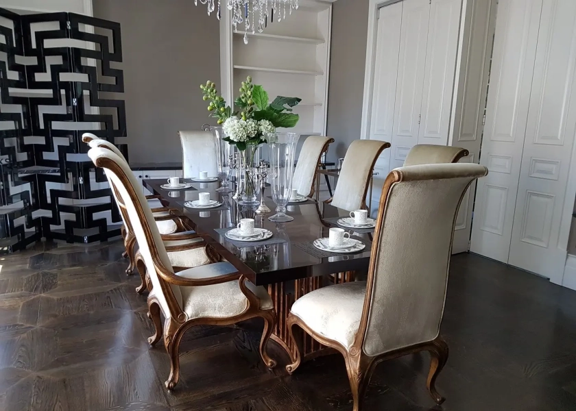 American Oak hand-made Monticello Flooring with circumnavigating border designs. With a Stained Waterbased Coating. Satin in sheen - Formal Dining