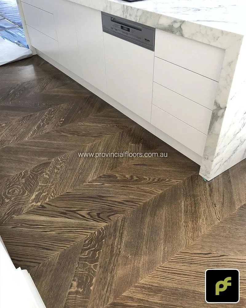 European Oak Chevron Parquetry with a Stained Water-Based Polyurethane Finish. Satin in sheen.