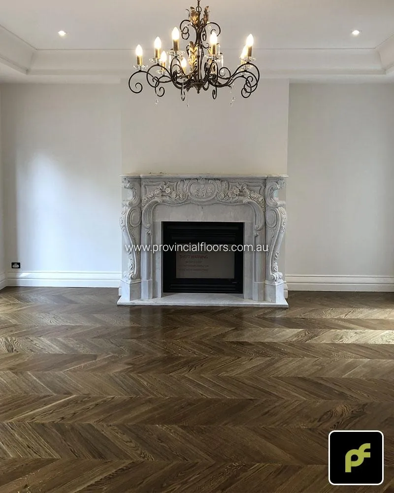 European Oak Chevron Parquetry with a Stained Water-Based Polyurethane Finish. Satin in sheen.