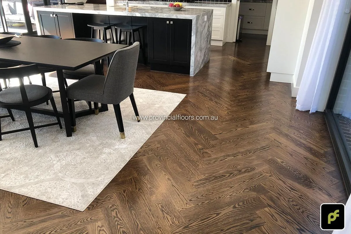 American Oak Herringbone Parquetry with a Stained Water-Based Polyurethane Finish. Satin in sheen.
